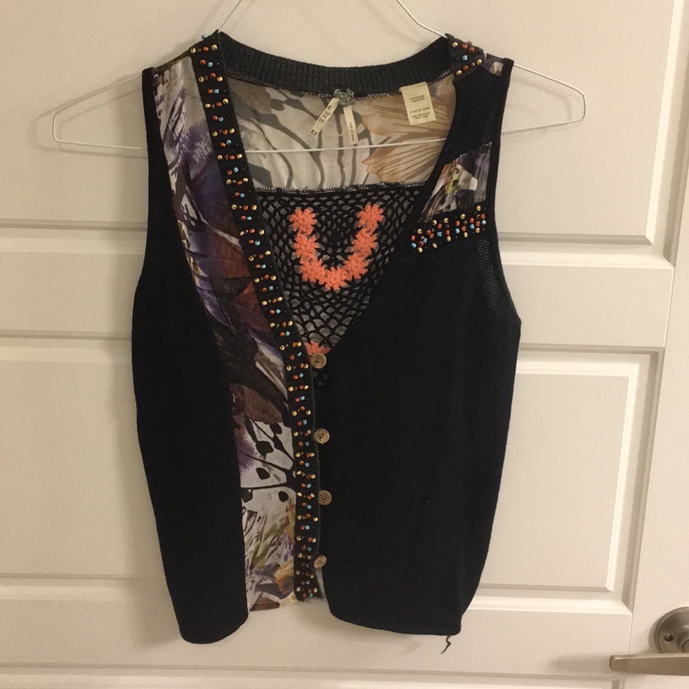 Buckle sweater vest